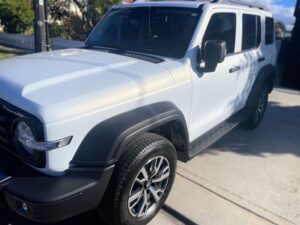 Vince's Car Detailing studio applying System X ceramic coating to a luxury car near Pyrmont.