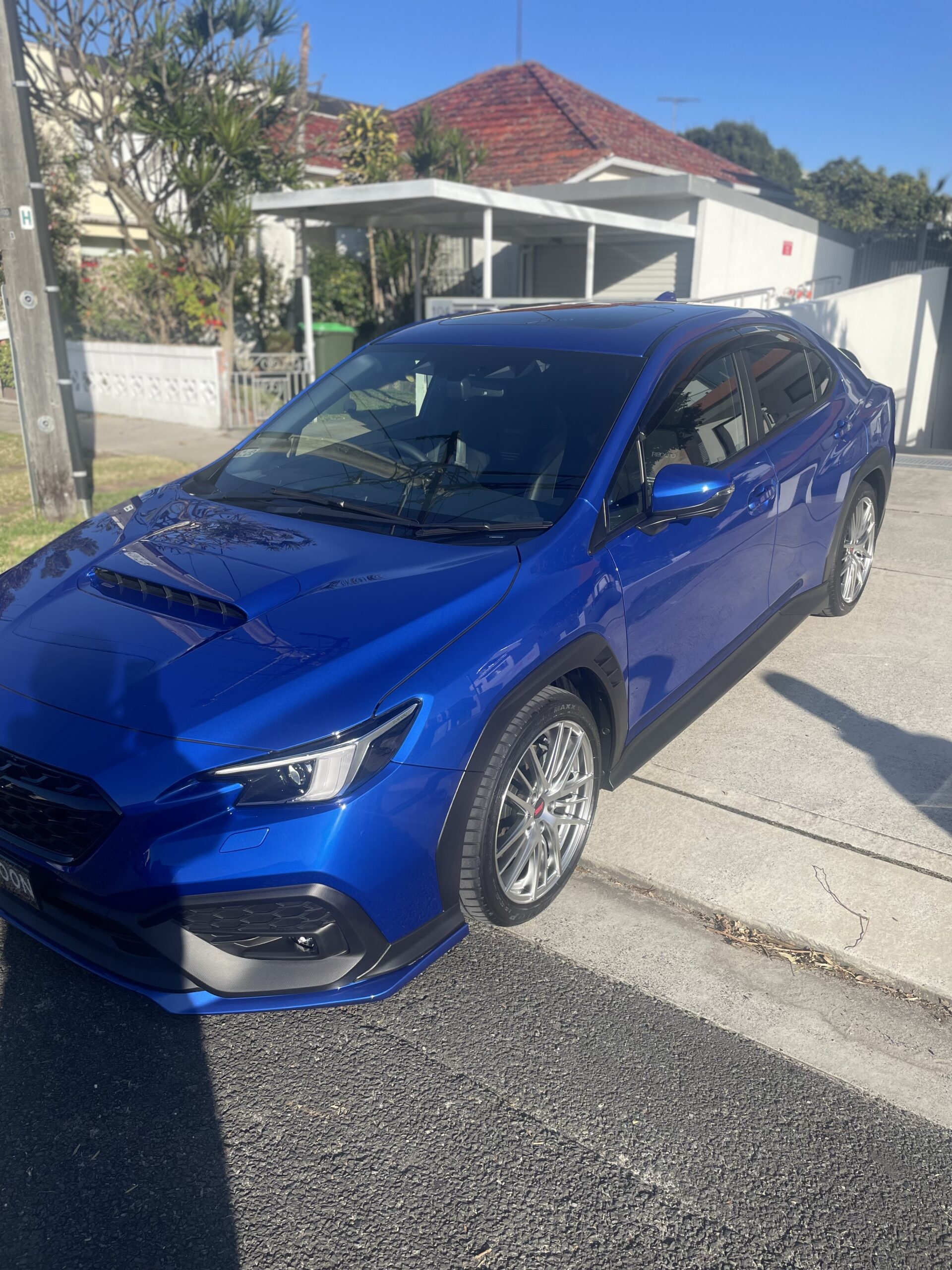 High-end ceramic coating application inside a dedicated detailing studio for Sydney customers